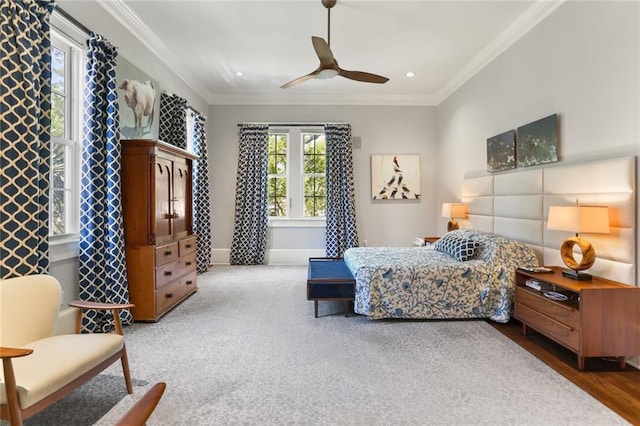 bedroom featuring ceiling fan and ornamental molding