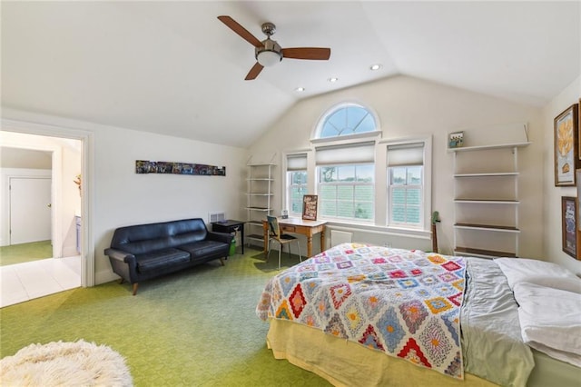 carpeted bedroom featuring vaulted ceiling and ceiling fan