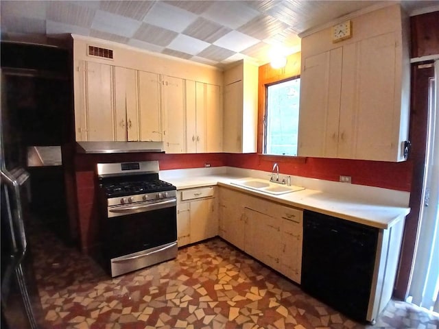 kitchen with stainless steel range with gas cooktop, black dishwasher, and sink