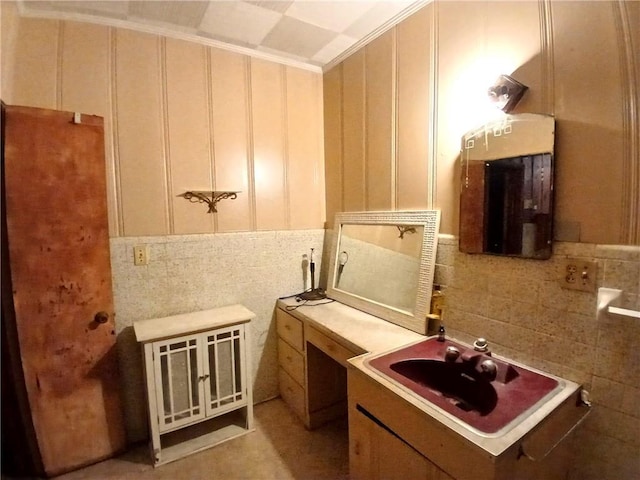 bathroom with sink and ornamental molding