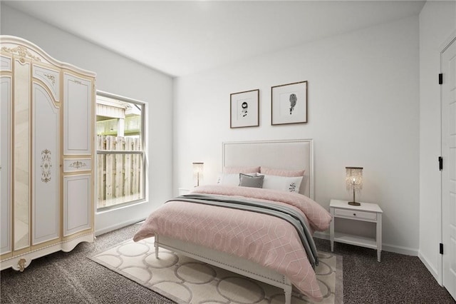 bedroom featuring baseboards and carpet floors