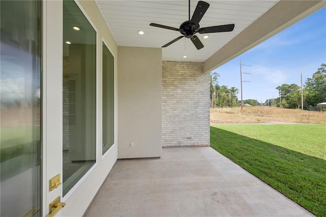 view of patio with ceiling fan