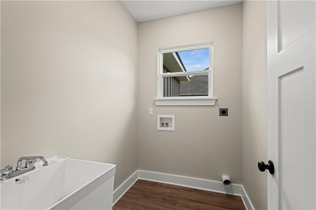 laundry area featuring washer hookup, dark hardwood / wood-style floors, hookup for an electric dryer, and sink