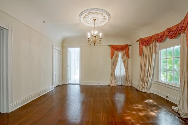 1521 Dufossat St, New Orleans, LA 70115 - unfurnished room with a chandelier, hardwood / wood-style floors, and baseboards