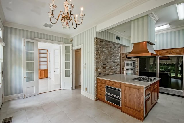 1521 Dufossat St, New Orleans, LA 70115 - kitchen featuring appliances with stainless steel finishes, wallpapered walls, ornamental molding, a chandelier, and brown cabinetry