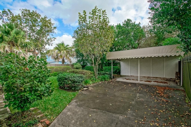 view of patio / terrace featuring a carport