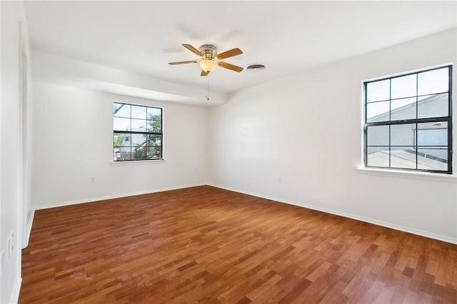 unfurnished room featuring ceiling fan and wood-type flooring