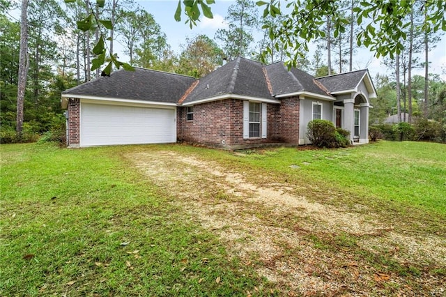 exterior space featuring a garage and a front yard