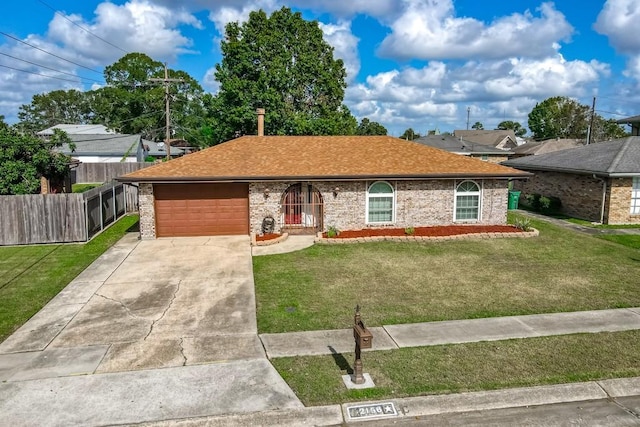 single story home with a garage and a front lawn