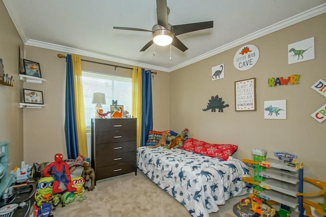 carpeted bedroom with ornamental molding and ceiling fan