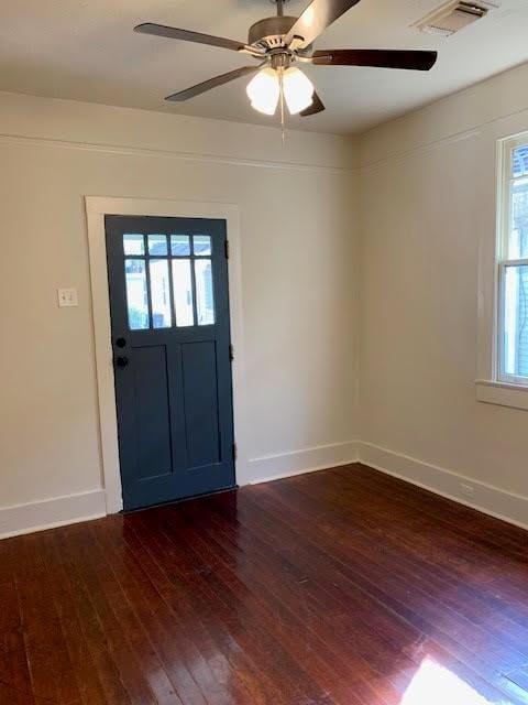 entrance foyer with ceiling fan and dark hardwood / wood-style floors