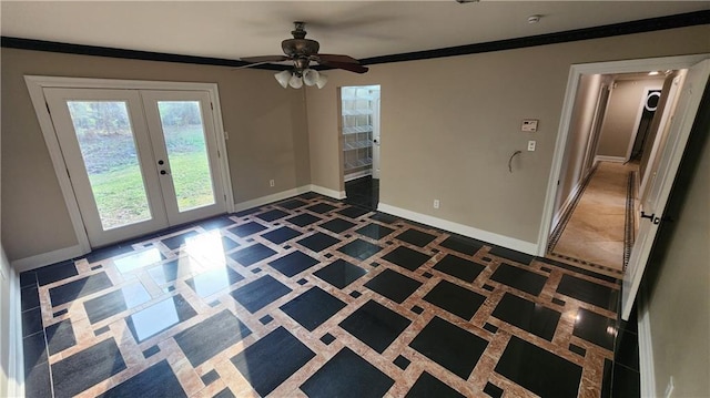 interior space featuring ceiling fan, french doors, and ornamental molding