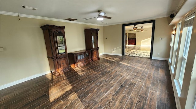 unfurnished living room featuring dark hardwood / wood-style floors, crown molding, and ceiling fan