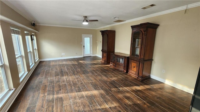 interior space featuring ornamental molding, plenty of natural light, dark hardwood / wood-style floors, and ceiling fan