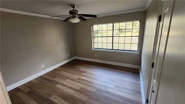 unfurnished room featuring hardwood / wood-style flooring, ceiling fan, and crown molding