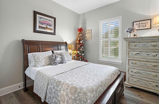 bedroom featuring dark hardwood / wood-style floors