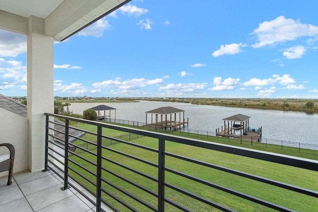 balcony featuring a water view