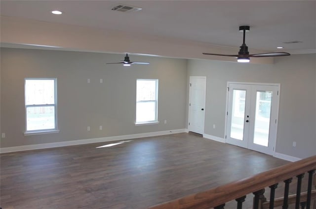 unfurnished room with french doors, dark hardwood / wood-style flooring, and ceiling fan