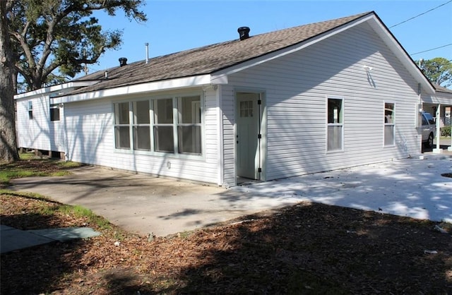 back of property featuring a patio