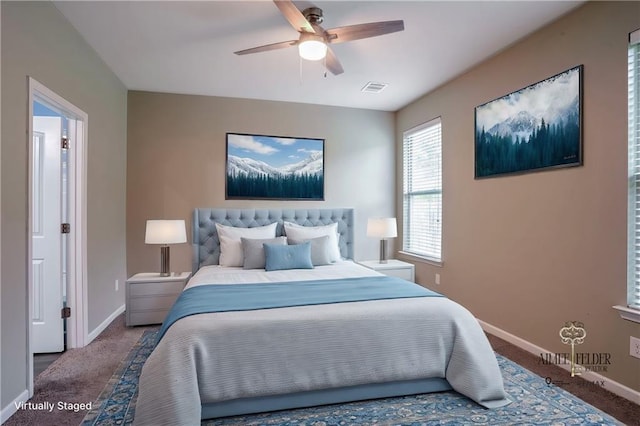 bedroom featuring ceiling fan and carpet floors