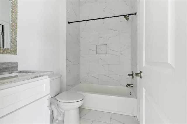 full bathroom featuring vanity, toilet, and tiled shower / bath combo