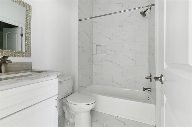 full bathroom with vanity, toilet, and tiled shower / bath combo