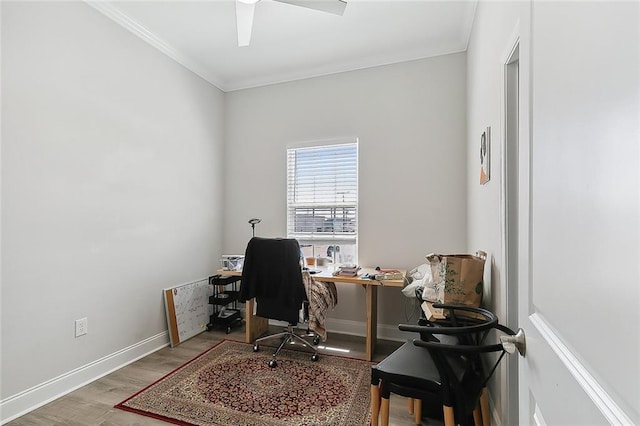 office with ceiling fan, wood-type flooring, and ornamental molding