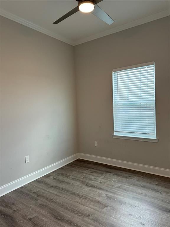 unfurnished room with ceiling fan, wood-type flooring, and crown molding