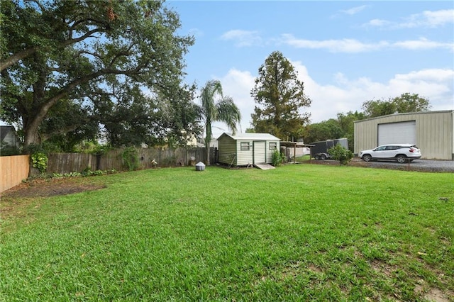 view of yard featuring a shed and a garage