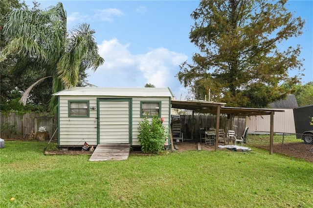 view of outdoor structure with a lawn