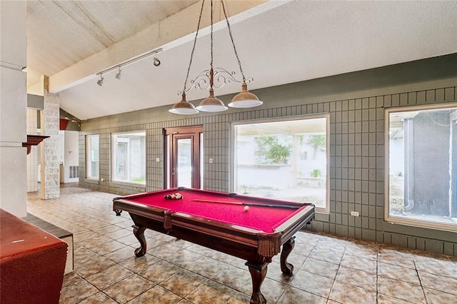 playroom featuring vaulted ceiling with beams, a textured ceiling, tile patterned flooring, rail lighting, and pool table