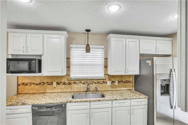 kitchen featuring white cabinetry, sink, and black appliances