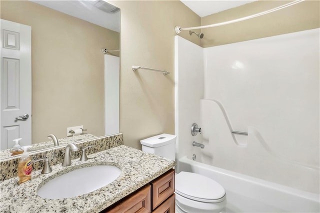 full bathroom with vanity, toilet, and tub / shower combination