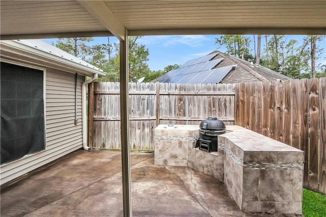 view of patio / terrace featuring an outdoor kitchen