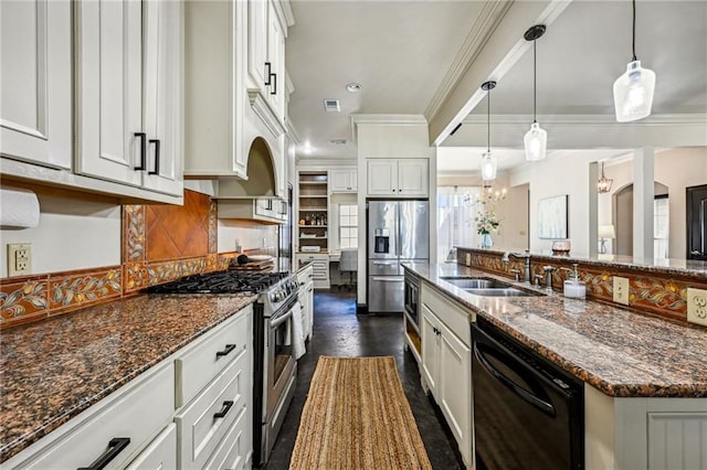 kitchen featuring white cabinets, appliances with stainless steel finishes, tasteful backsplash, and dark stone countertops