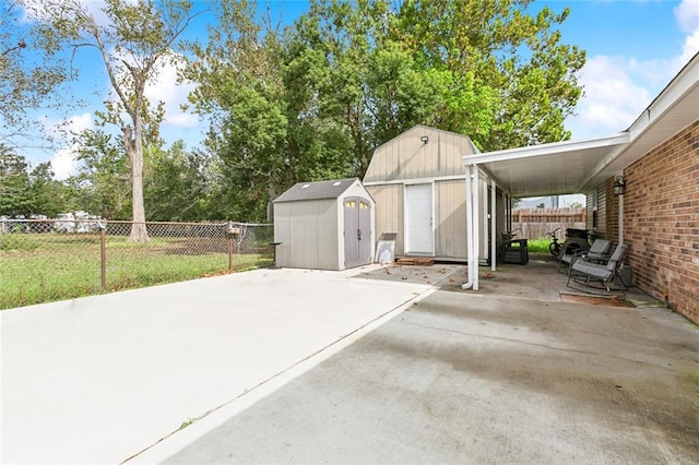 view of patio with a storage shed