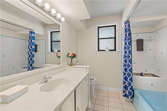 full bathroom with tile patterned flooring, vanity, toilet, and shower / bathtub combination with curtain