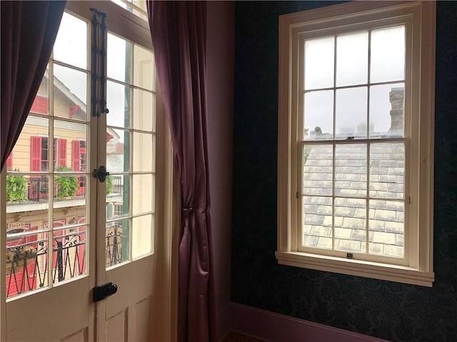 1225 Bourbon St Unit B, New Orleans, LA 70116 - doorway featuring french doors and plenty of natural light