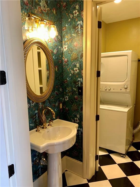 bathroom with stacked washer / dryer