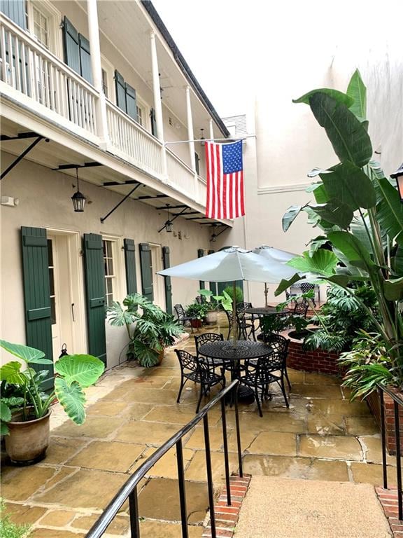 view of patio with a balcony