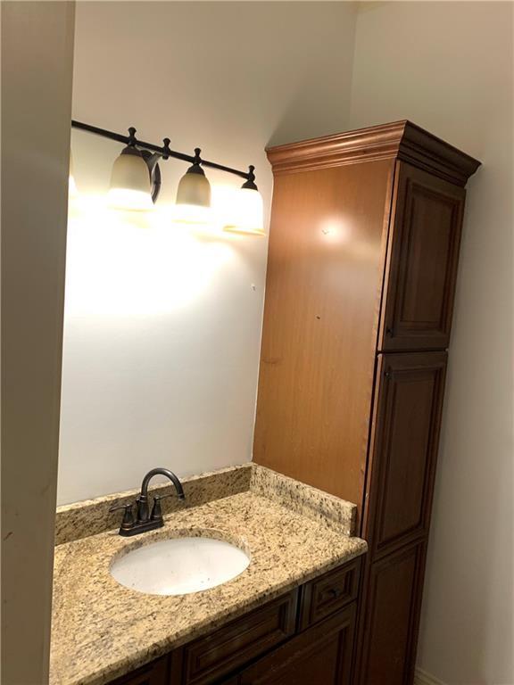 1225 Bourbon St Unit B, New Orleans, LA 70116 - bathroom featuring vanity