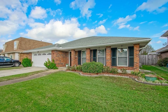 ranch-style home featuring a garage and a front yard