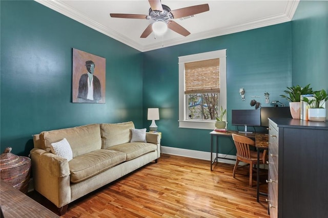 interior space with light hardwood / wood-style flooring, ceiling fan, and ornamental molding