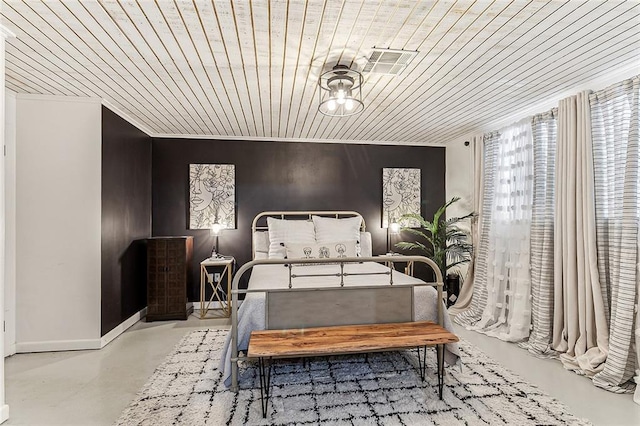 bedroom with wood walls and wood ceiling