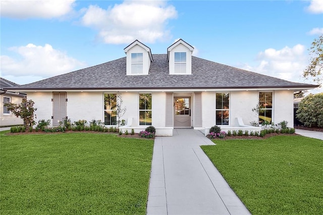 view of front of home with a front yard