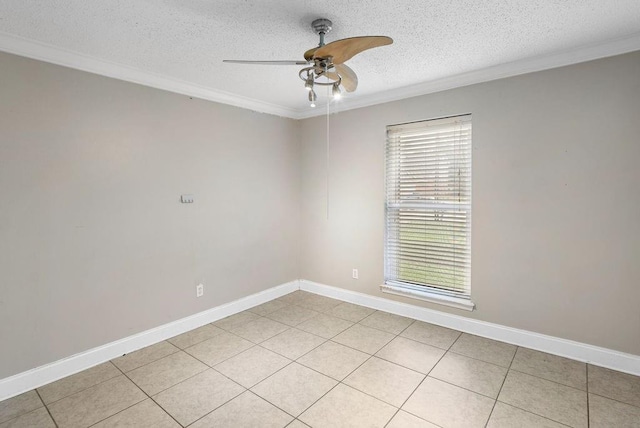 unfurnished room featuring ceiling fan, a textured ceiling, light tile patterned floors, and ornamental molding