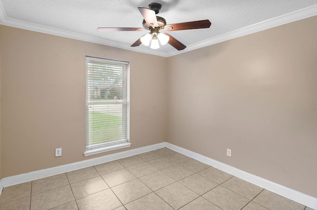 tiled spare room with ornamental molding, a textured ceiling, and ceiling fan