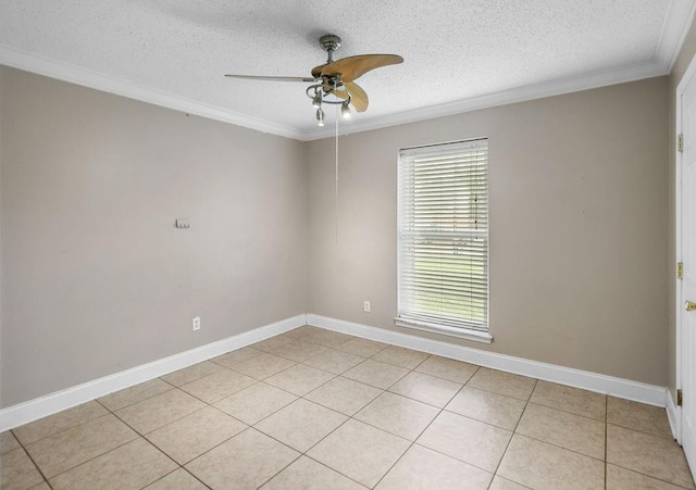 tiled spare room with ceiling fan, a textured ceiling, and ornamental molding