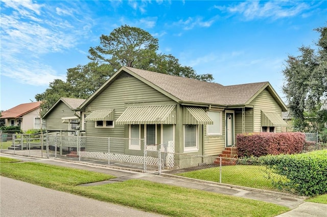 view of front facade with a front yard