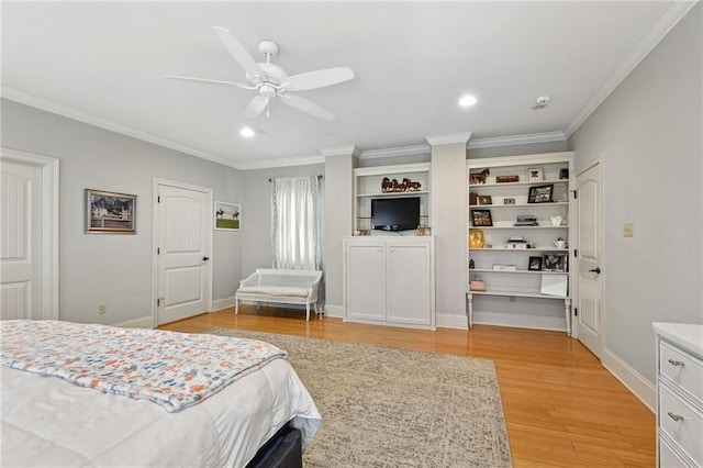 bedroom with light wood-type flooring, ceiling fan, and crown molding